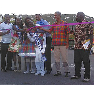 Gov. John deJongh Jr. (center) joins other Carnival dignitaries in opening the Carnival Village.