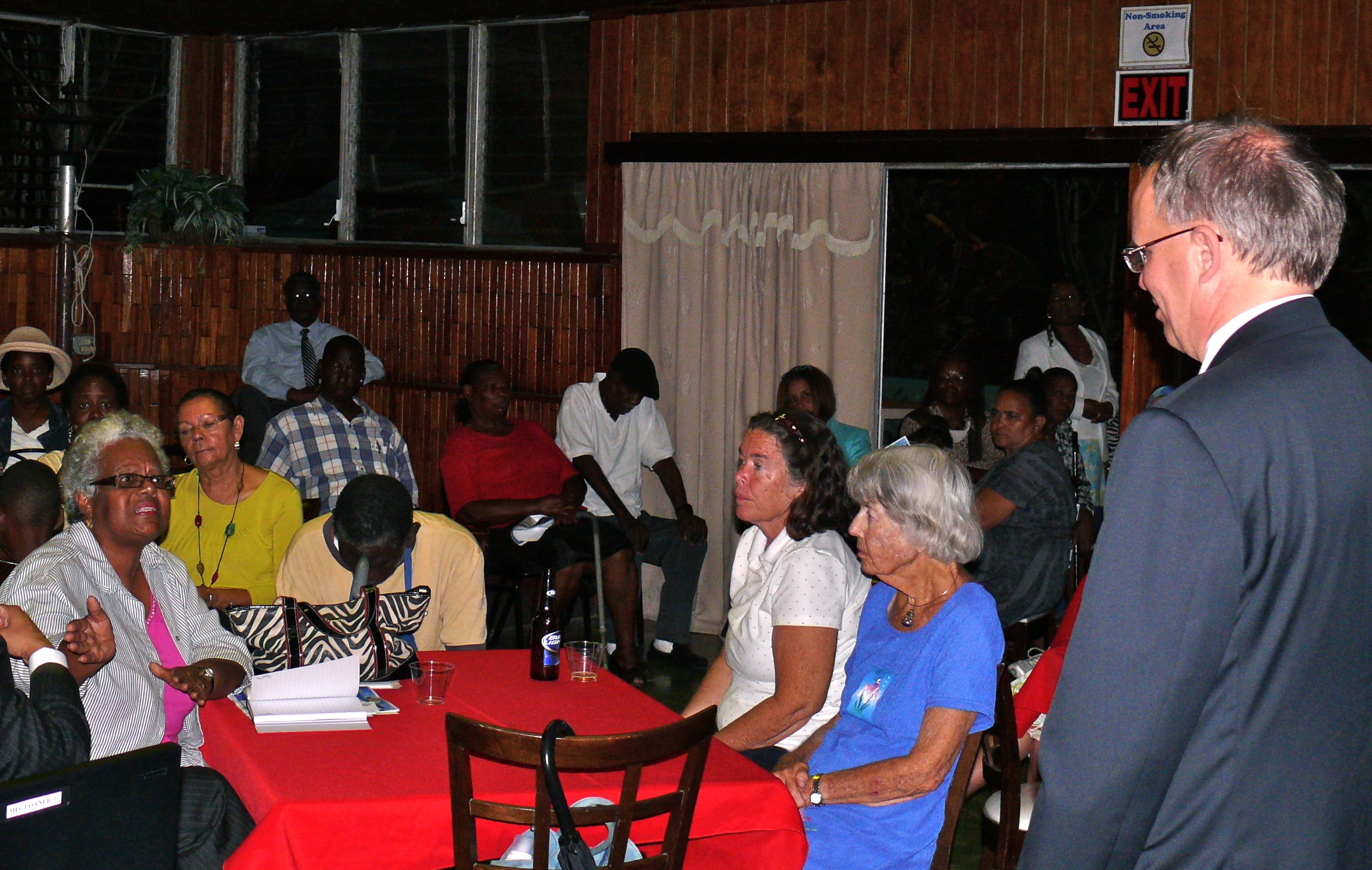 Gov. Juan F. Luis Hospital CEO Jeff Nelson (right) at a town forum at Villa Morales Restaurant in Frederiksted Tuesday.