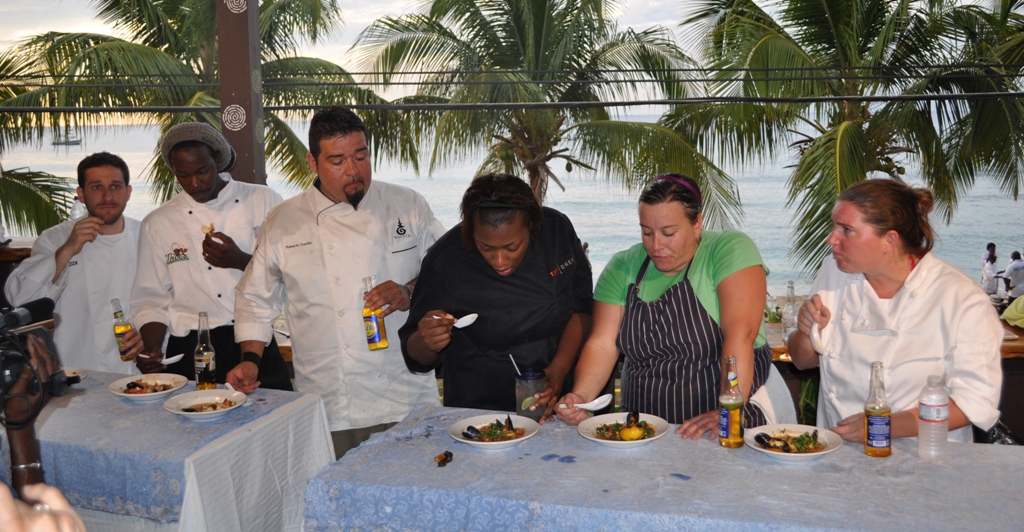 Chefs Michael Ferarro, Leslie Gumbs, Robert Trevino, Tiffany Derry, Liza Shaw, and Jennifer Litwin (from left) sample the meals they prepared in the competition.