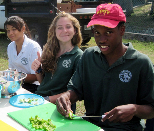 Gifft Hill Students Yalfri Santana, 13, Rachel Myers, 14, and K’yon Louis, 14, at a recent farmer’s market.