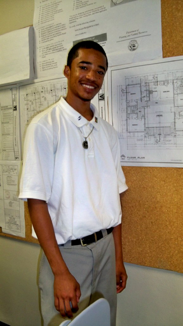 Khalid James stands in the architectural drafting room at CTEC.