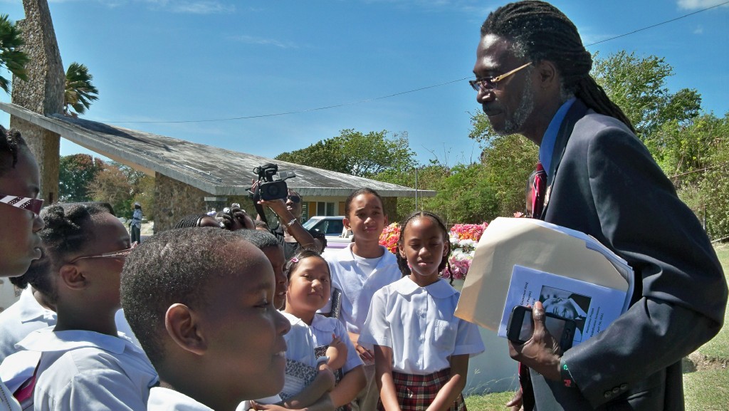 Sen. Terrence "Positive" Nelson talks to students about the late governor.