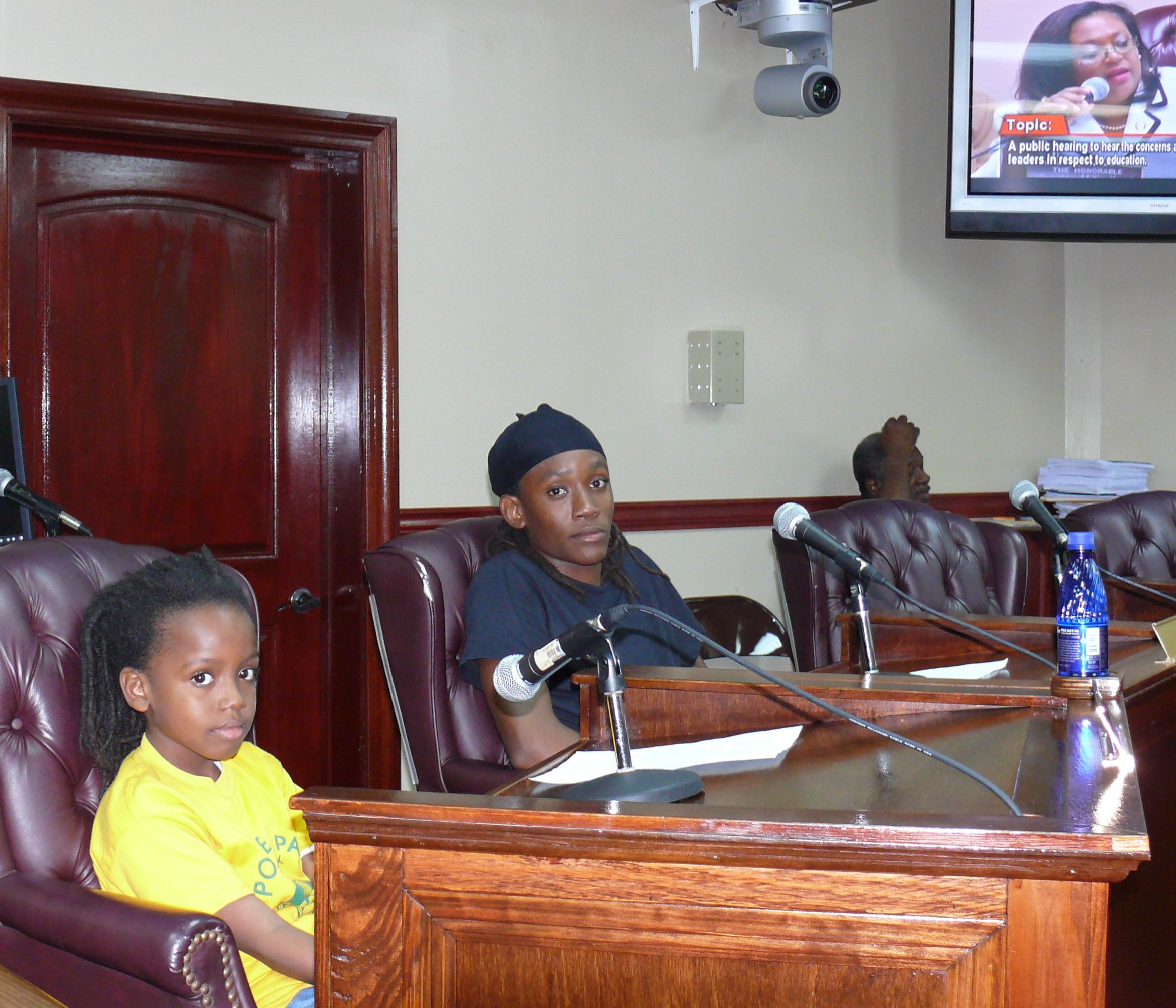 Claude O. Markoe Elementary student Kemuel Russell and St. Croix Educational Complex junior Elishua Mitchell testify before a Senate panel in Frederiksted Monday evening.