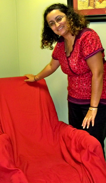 Serena Sundaram shows one of the reclining chairs her patients relax in. 