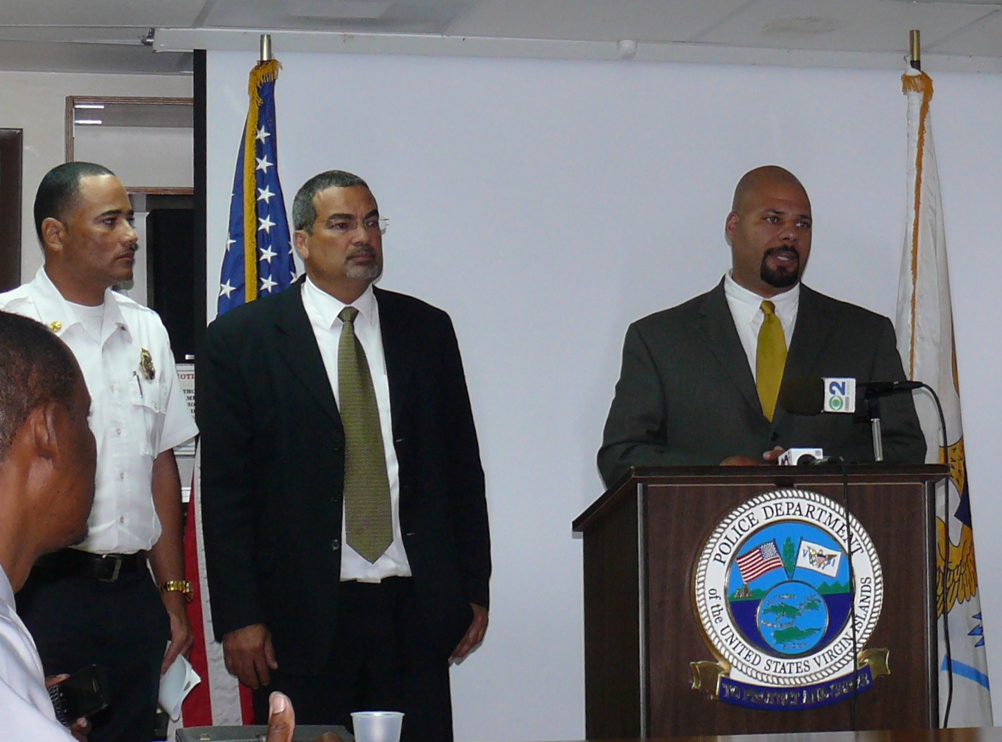 DPNR Director of Permits Phillip Smith (right) taking a question at Monday's Police Department press conference.