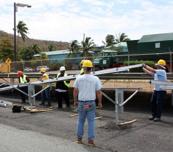 Unloading solar panels at King airport.