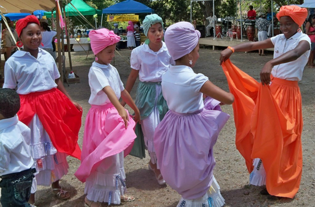 The dance group 'De Nuestras Raices' performs at the Starving Artists Sale.