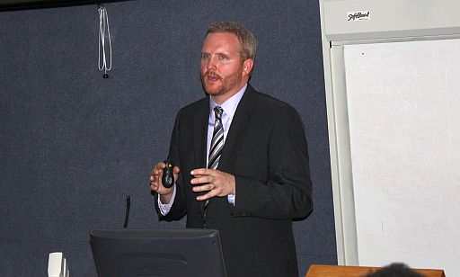 Energy expert Adam Warren talks to conference participants about the V.I.'s energy roadmap.