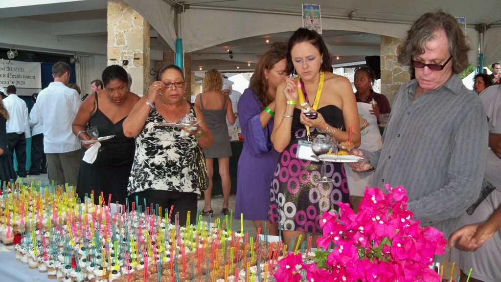 Attendees decide what  sweets to sample at the Starfish Patisserie table.