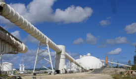 Hovensa petroleum coke storage domes and enclosed conveyer belt for loading onto ships.