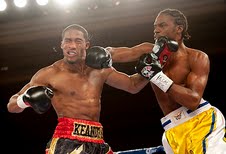 John Jackson (right) lands a hard right to opponent Keandre Leatherwood. (Photo courtesy Aaron Snowell)