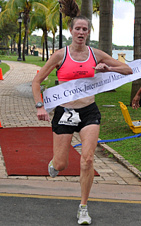 Maureen Manning was the first woman across the finish line at the Frederiksted waterfront.