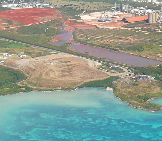 The great red mound of aluminum refining tailings on St. Croix's South Shore. (Bill Kossler photo)