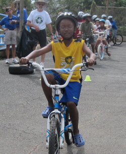 Bicycle Rodeo riders negotiate a training course.