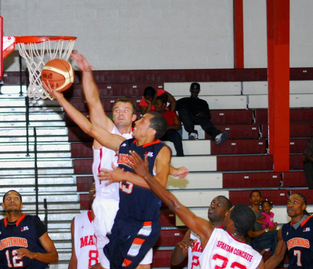 Bobby Evans soars past a Magic defender to score two of his 22 points.