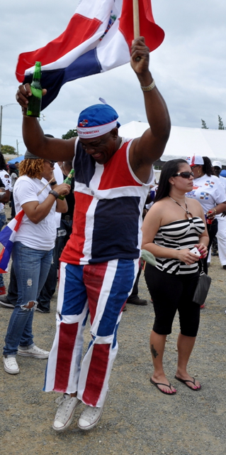 Ceasar Thomas jumps up with pride as he celebrates Dominican Republic Independence Day.