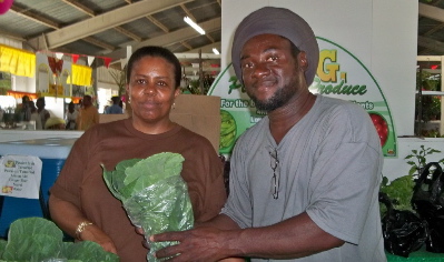 Laurie and Grantley Samuel sell locally grown greens at AgriFest.