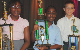Top spelling bee finishers (from left) Quelania John-Baptiste, Dylante DeHaarte and Marcus Norkaitis.