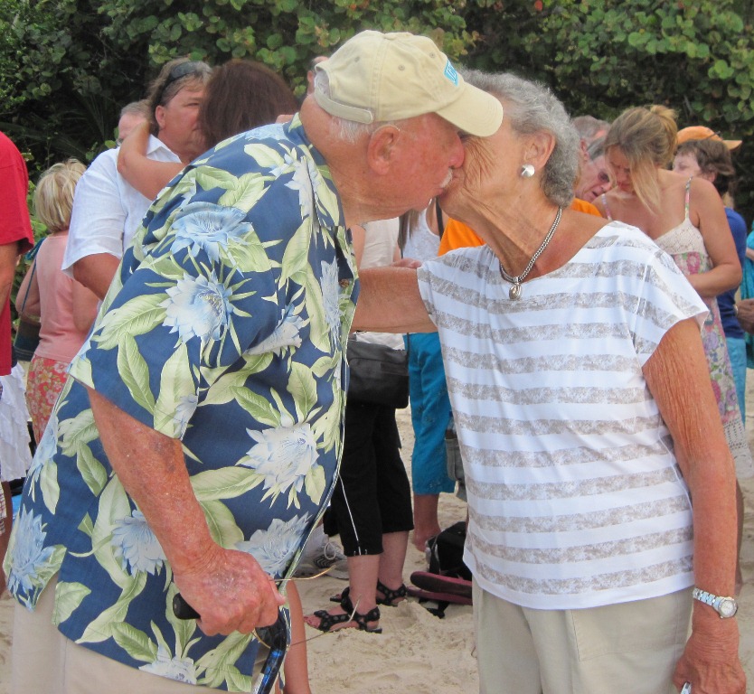 Howard and Jackie Levine punctuate their 'I Dos' with a kiss Monday at Trunk Bay.