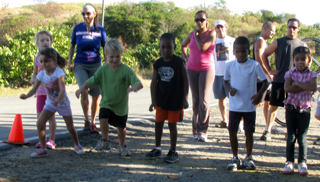 Five-to-6-year-old racers line up at the start of the St. Croix Kids Duathlon.