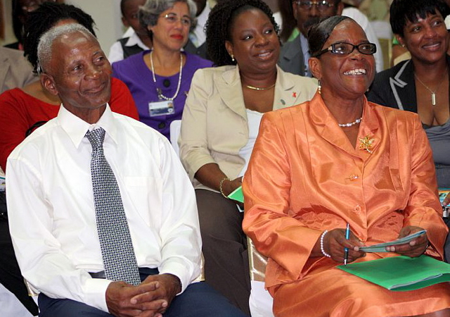 Cynthia Browne Stapleton, front row, smiles with her husband at the ceremony dedicating the hospital's labor and delivery unit to her.