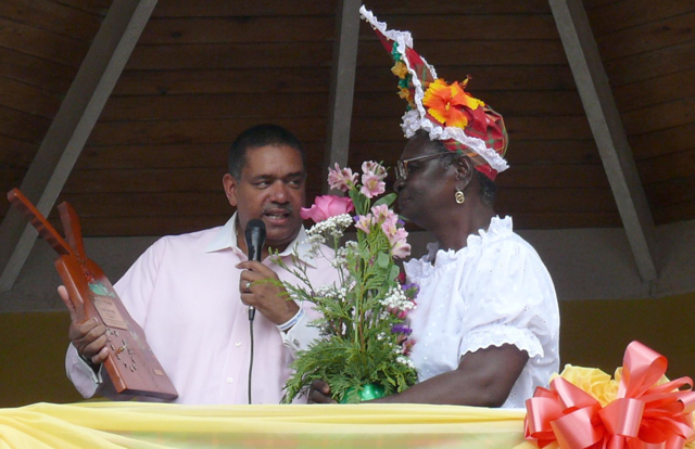 Gov. John de Jongh Jr. presents a plaque to Jane Meyers to memorialize a lifetime of cooking. 