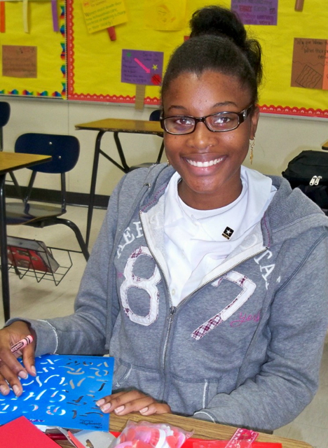 Jahlise Francis makes greeting cards for senior citizns.