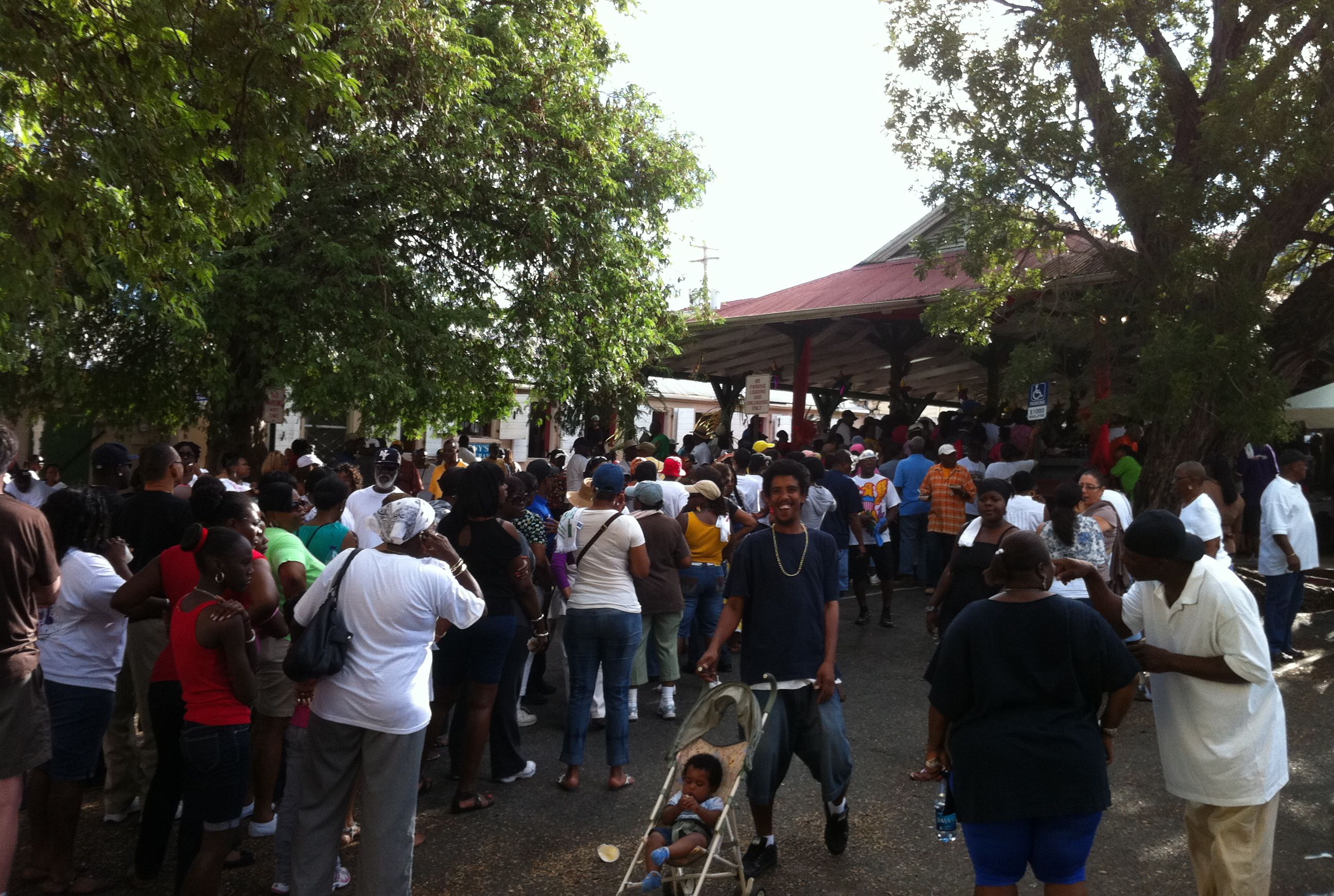 Throngs of Crucians line up for breakfast in the Christian "Shan" Hendricks Vegetable Market 