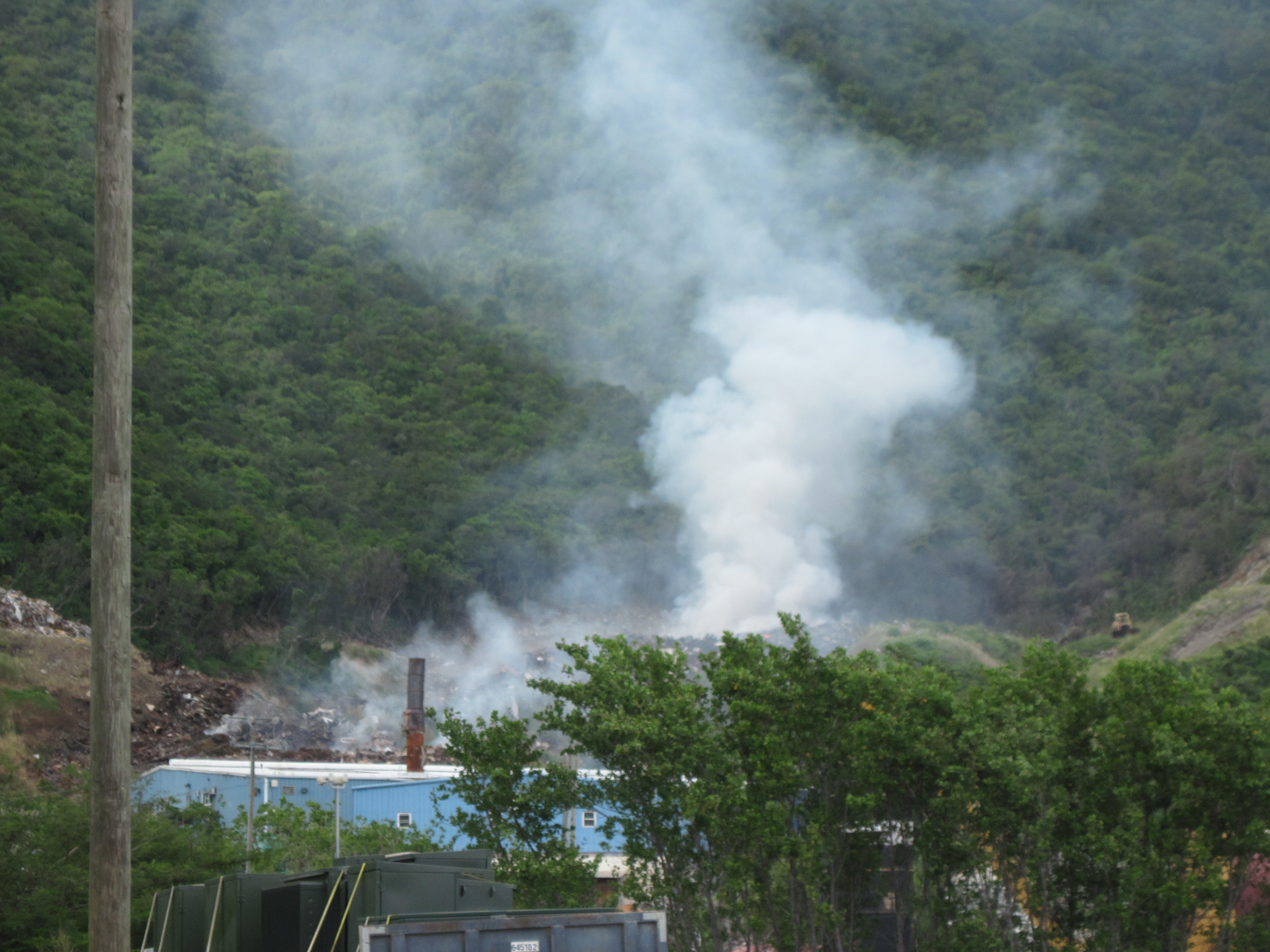 This file photo from November 2010 shows the Tortola dump smoldering. (Photo Lynda Lohr)