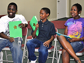 Kijon Washington-Moore, Sevon Washington and Xiaxiang Washington at the youth meeting.