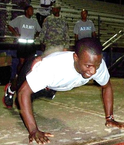 Winner of the NCO of the Year title, Sgt. Philip Grant, does push ups in the competition. (Photo provided by Staff Sgt. Valence Modeste)