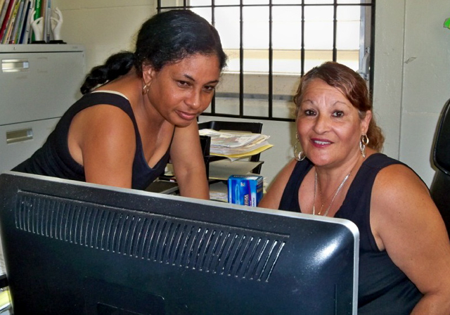 Yvonne Petersen, left, and Maria Morales at Beyond Visions resource center.