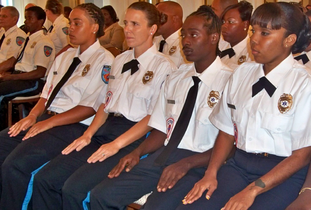 Members of St. Croix Rescue's newest recruit class listen to speakers at their graduation Sunday.