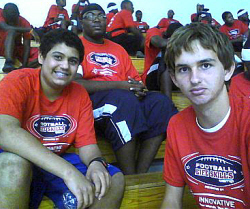 Rohan Samtani (from left), Giavanni Bird and Robert Hahn wait to take the field during Friday's camp. 