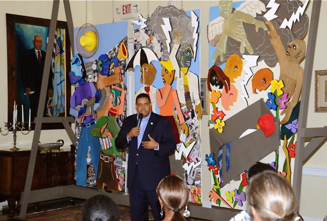 Gov. John de Jongh Jr. comments on the mural during its presentation Saturday. (Photo courtesy of Government House.)