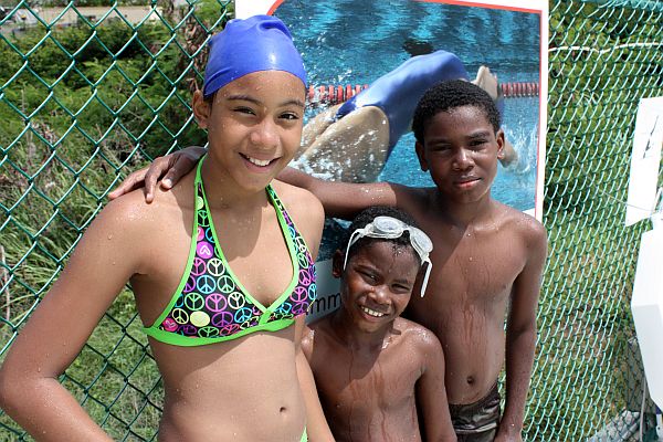 Ashley Fernandez, Ross Carrington and Andre Carrington (from left) are trying to improve their swimming skils through the Learn to Swim program.