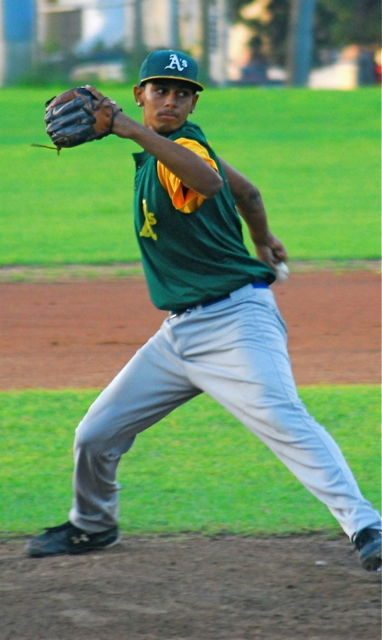 Mark Knight pitches for the A's in Saturday's come-from-behind win.