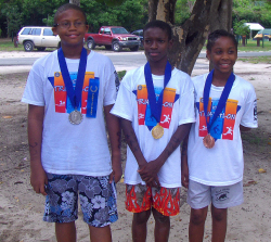 Winners in the 8-11 age group (from left), Latrell Sasso, 2nd place; Jordan Knight, 1st place; and Brittany Leonard, 3rd place. 