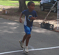 First grader Amir Ottley at the finish line.