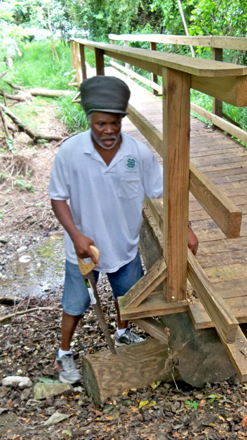 Olasee Davis works on a bridge support.
