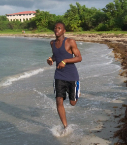 Lewellyn Taylor running along the Ha'Penny shoreline.