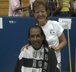 Jamie Rivera gets a haircut Friday from Theresa Morey. 