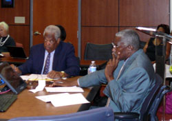 V.I. GERS Board of Trustees Chairman Raymond James and member Edgar Ross at Monday's board meeting.