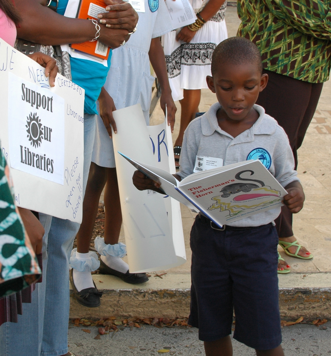 Kindergarten student Ki'Mani Thomas read his favorite book during the Save our Libraries rally held Wednesday at the Legislature. 