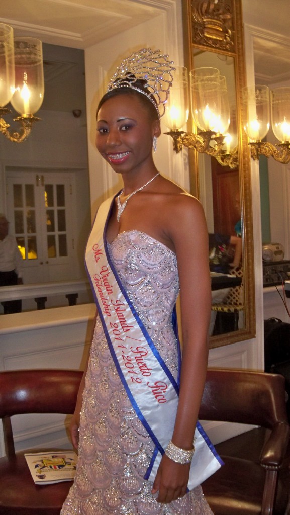 Miss VI/PR Friendship Queen Maria Encarnacion smiles for the Government House crowd.