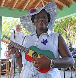 Vivian St. Juste plunks out a tune on the ukelele.