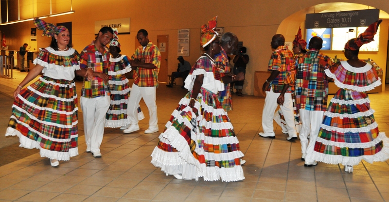 St. Croix Heritage Dancers perform for the newly arrived passengers from Denmark on the first charter by Bravo Tours.