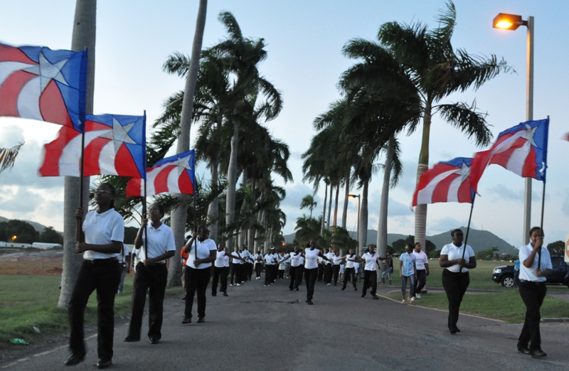 The St.Croix Educational Complex Marching Band leads UVI's sixth annual Red Ribbon March down Palm Drive. 