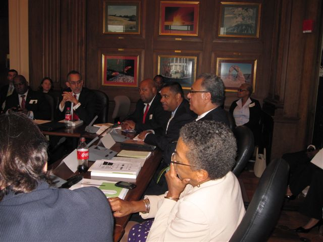 Delegate Christensen (foreground) and Gov. deJongh (center) meet with federal officials over a possible regional electrical grid.