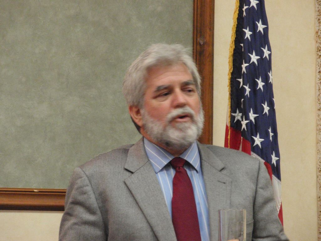 Human Services Commissioner Chris Finch addressing St. Thomas Rotary Sunrise. (Photo SAP)